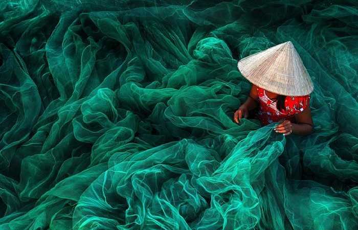 Рыболовные сети вьетнамской рыбачки